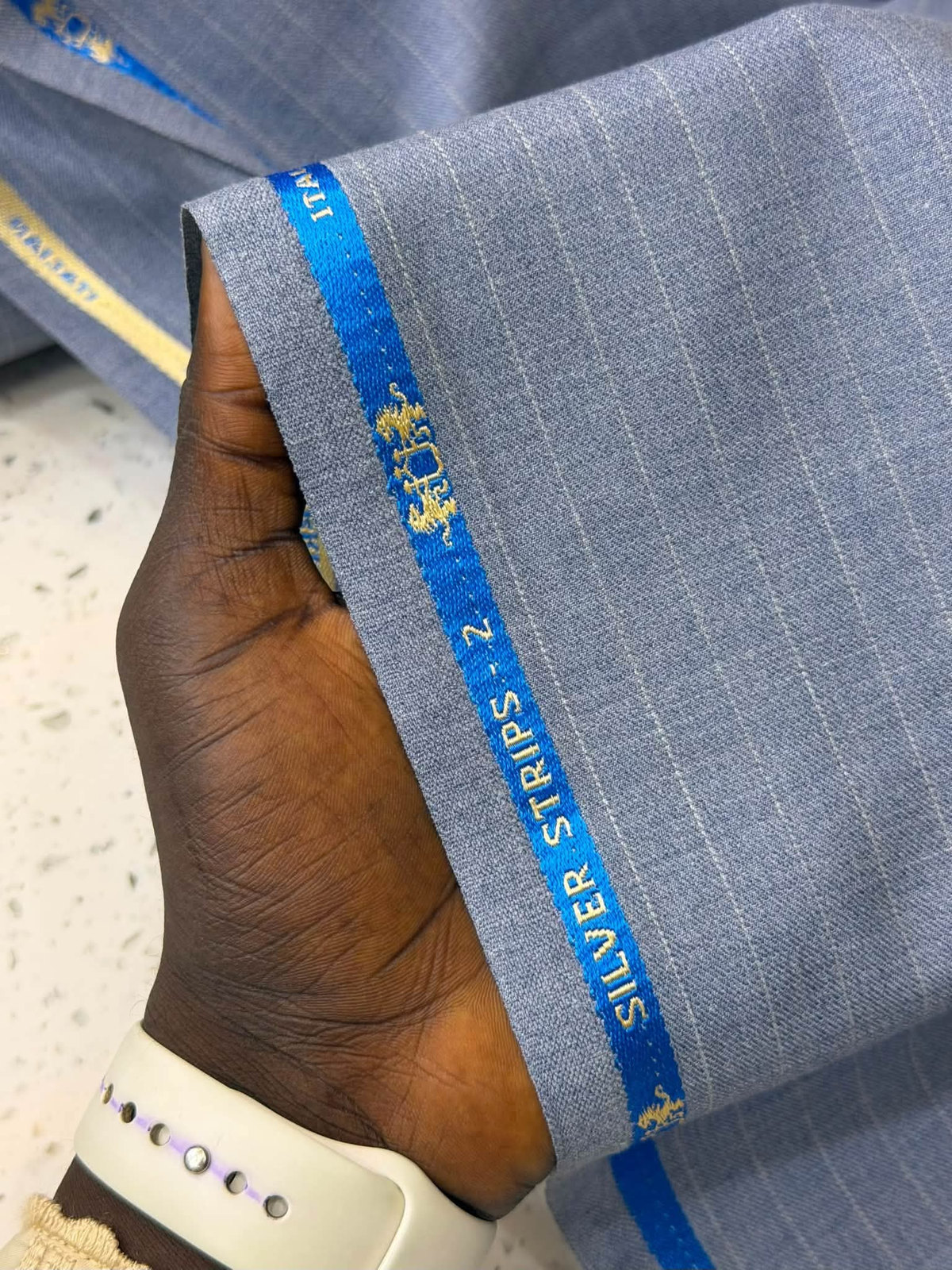 Blue-grey Silver Strips fabric with blue selvedge